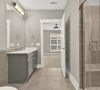 Modern bathroom with a glass shower, gray vanity, large mirror, and tile floor, leading to a bright bedroom with carpet.
