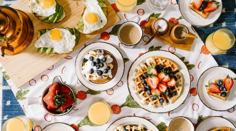 Enjoy the best breakfast with waffles, eggs on toast, and coffee at one of Carolina Square's inviting breakfast spots.